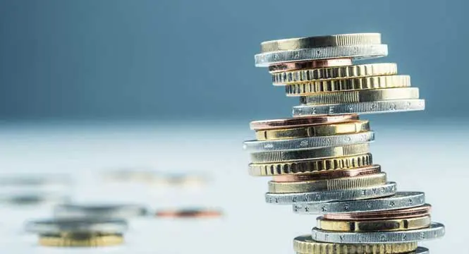 A close up of coins stacked on top of each other